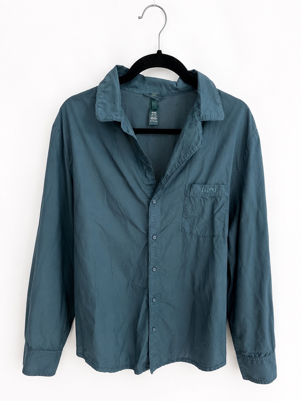 SKIMS teal shirt - great as a formal shirt or cover up